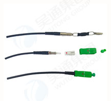 Through-the-wall fiber optic cable assembly